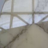 Tulip dining table in marble by Eero Saarinen for Knoll International.