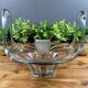 Thick glass centrepiece with raised handles in vintage design.