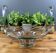 Thick glass centrepiece with raised handles in vintage design.