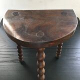 Half-moon tripod stool