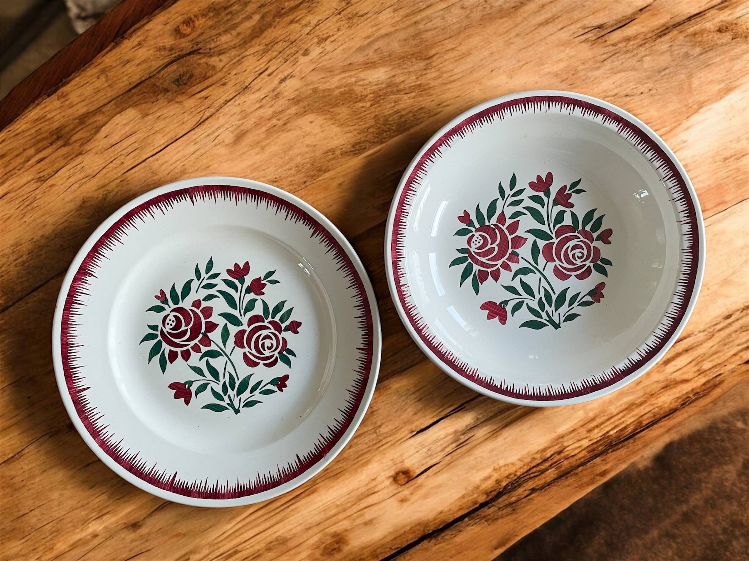 Antique plates and salad bowls in Longwy faience.