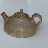 Vintage teapot in reeds