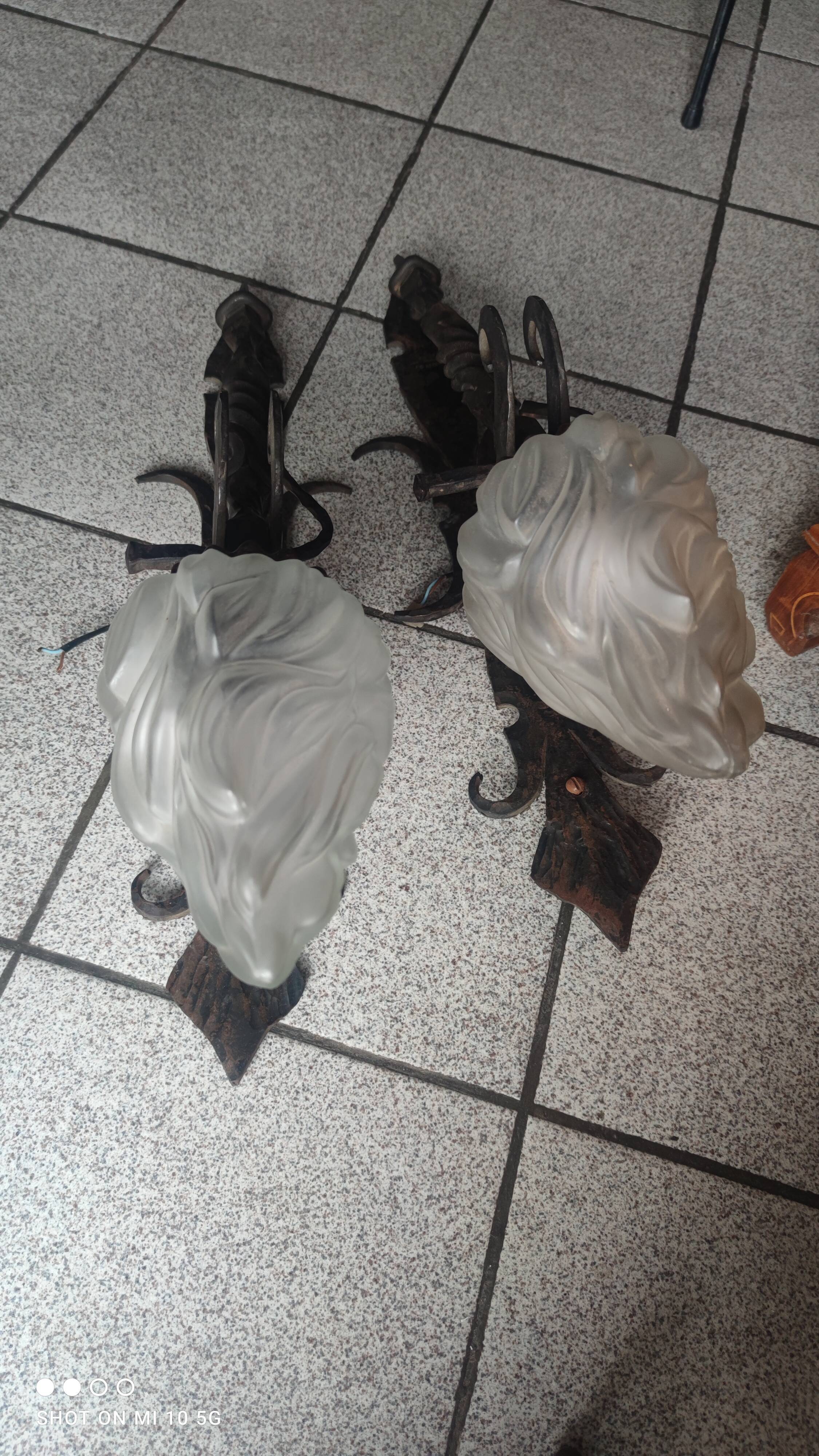 Pair of steel and glass torchieres circa 1950