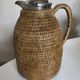 Wicker-covered thermos carafe designed by Ola Olson for Xtra 1980.