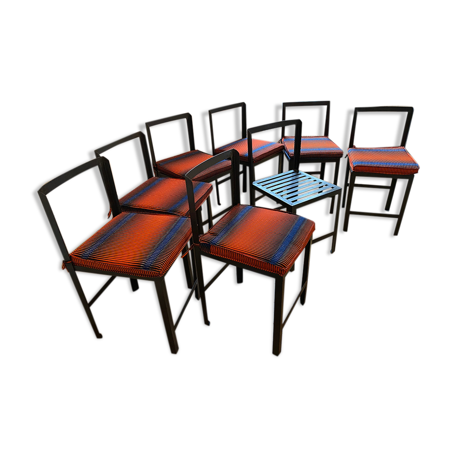 Set of 8 patinated and waxed raw steel chairs