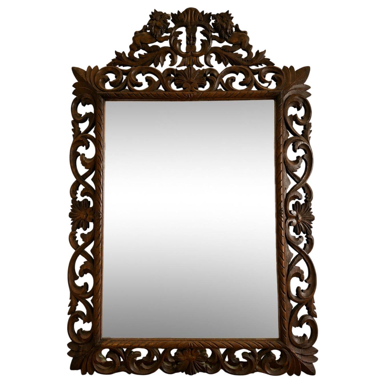 Large mirror with an openwork pediment in carved wood – Late 19th century