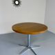 Old round table in solid wood and metal, vintage 70s design