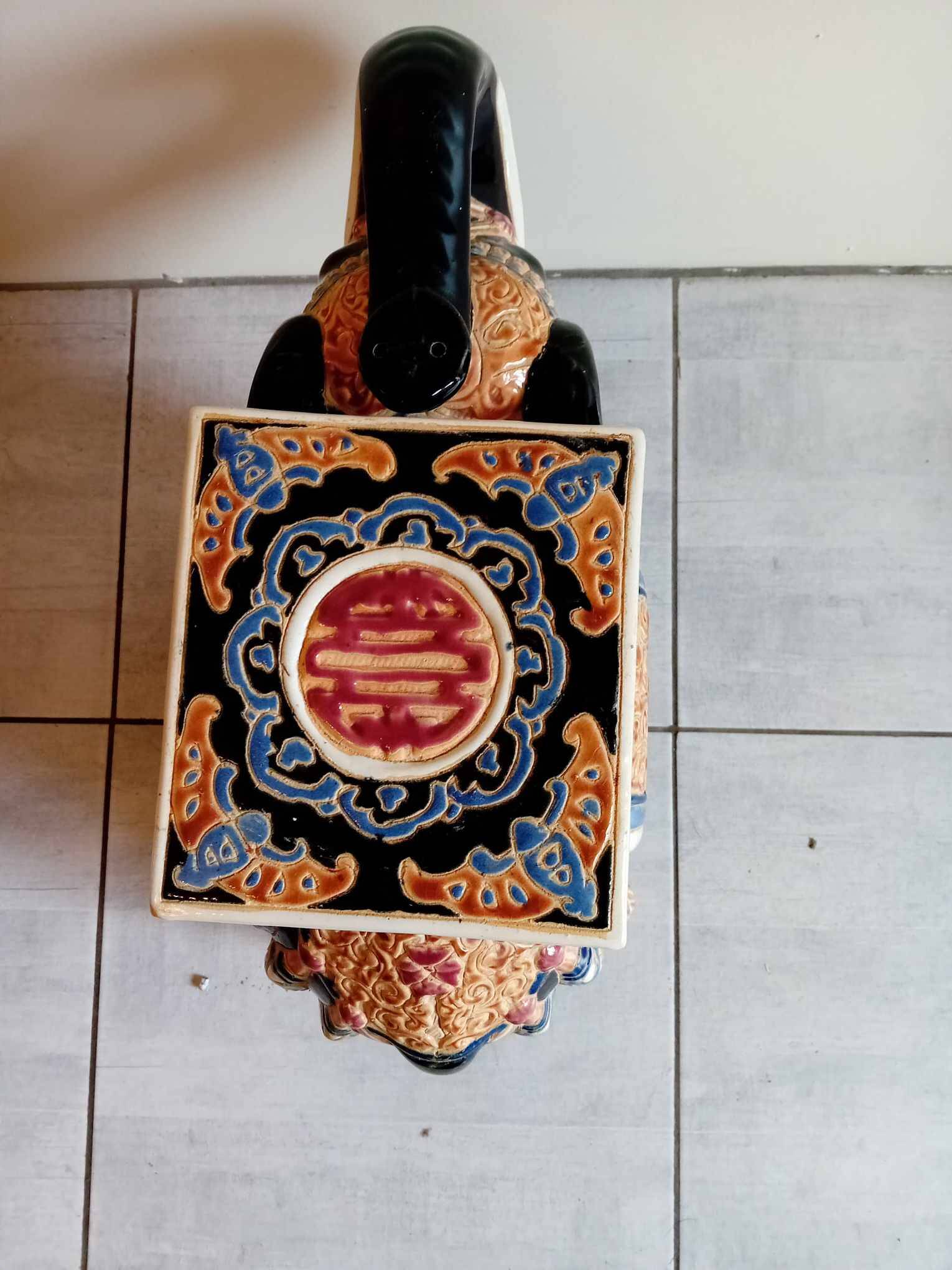 Elephant in black and beige glazed earthenware