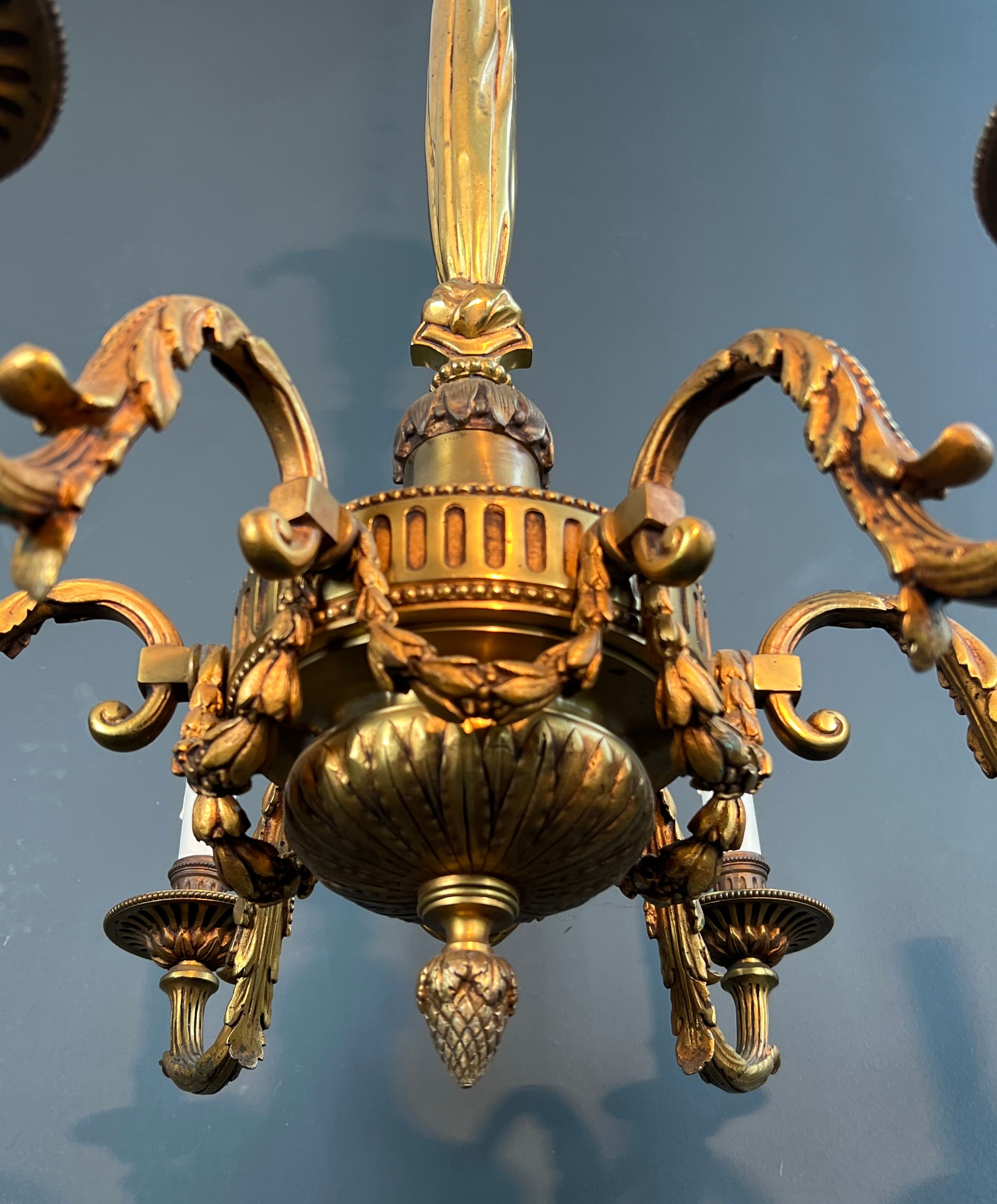 Bronze chandelier in Louis XVI style with 6 arms.