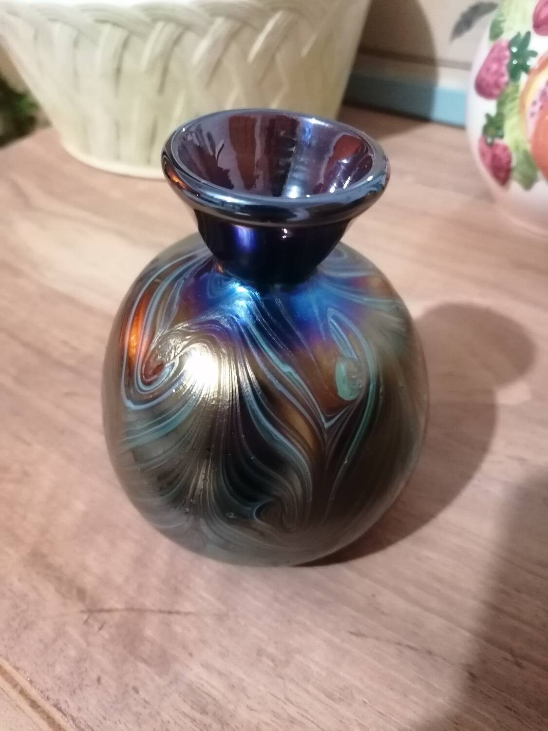 Iridescent marbled vase in the style of Loetz.