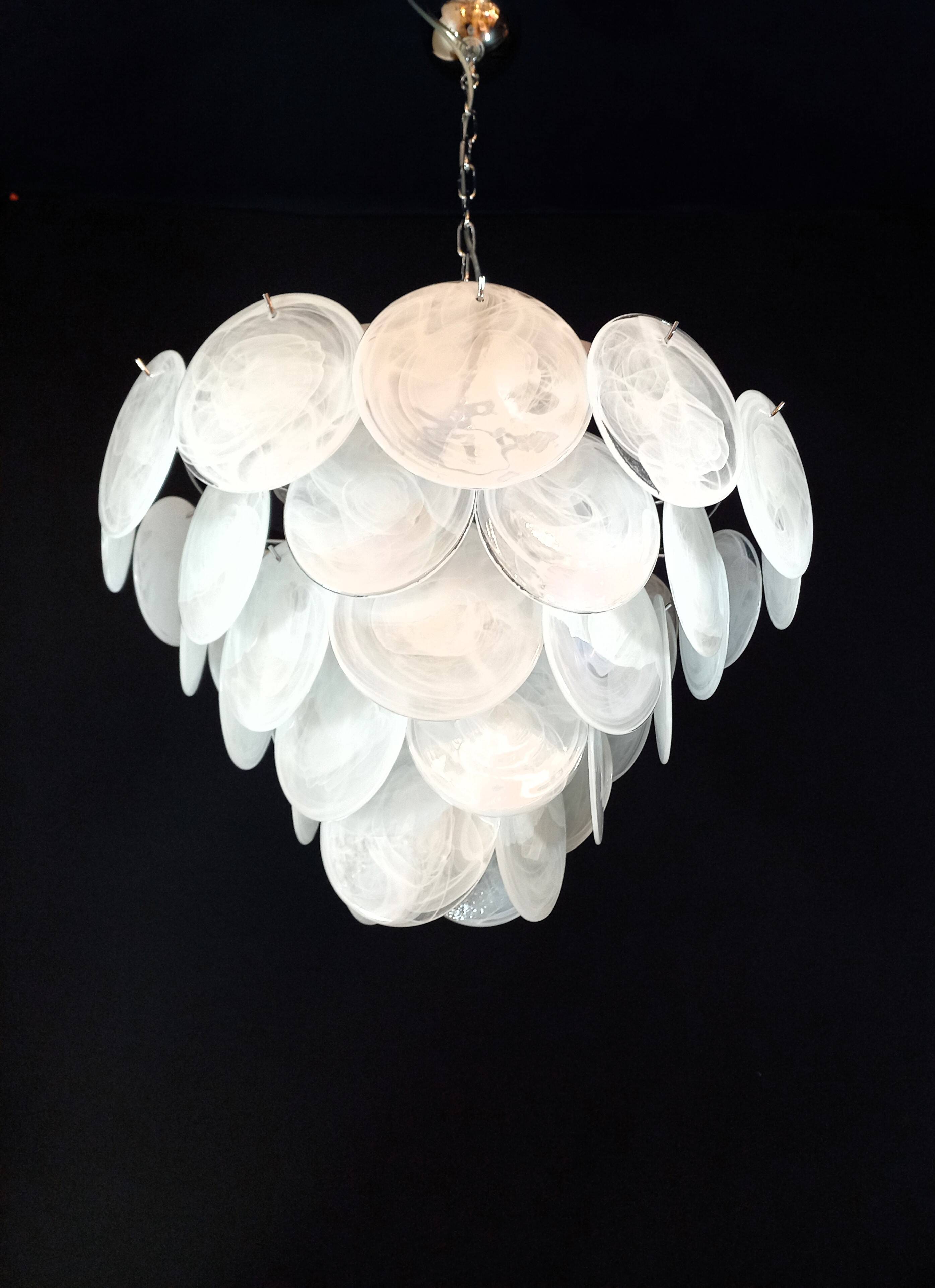 Handcrafted chandelier with Murano glass and handmade alabaster discs.