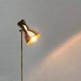 Minimalist brass floor lamp from the mid-century by Dieter Schulz for Wohnbedarf Ag, 1950s.