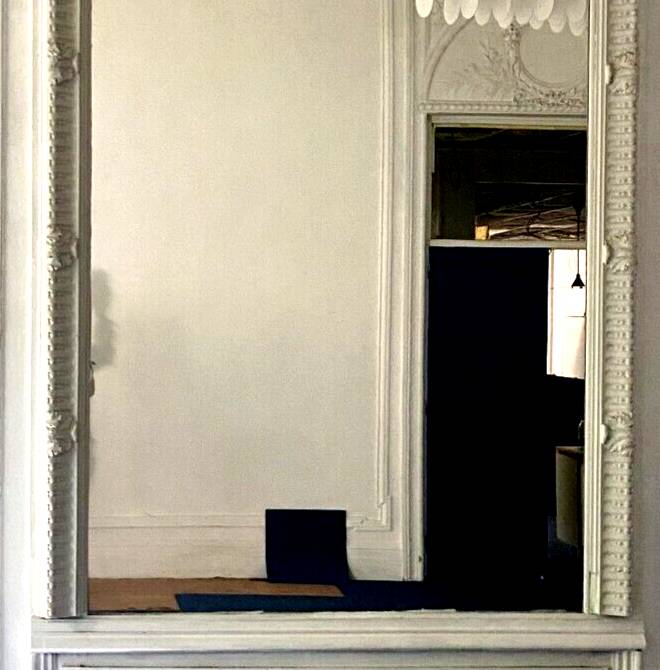 Louis XVI style mirror in wood and carved stucco 20th century