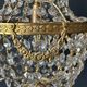 Golden bronze hot air balloon chandelier with glass pendants, mid-20th century.