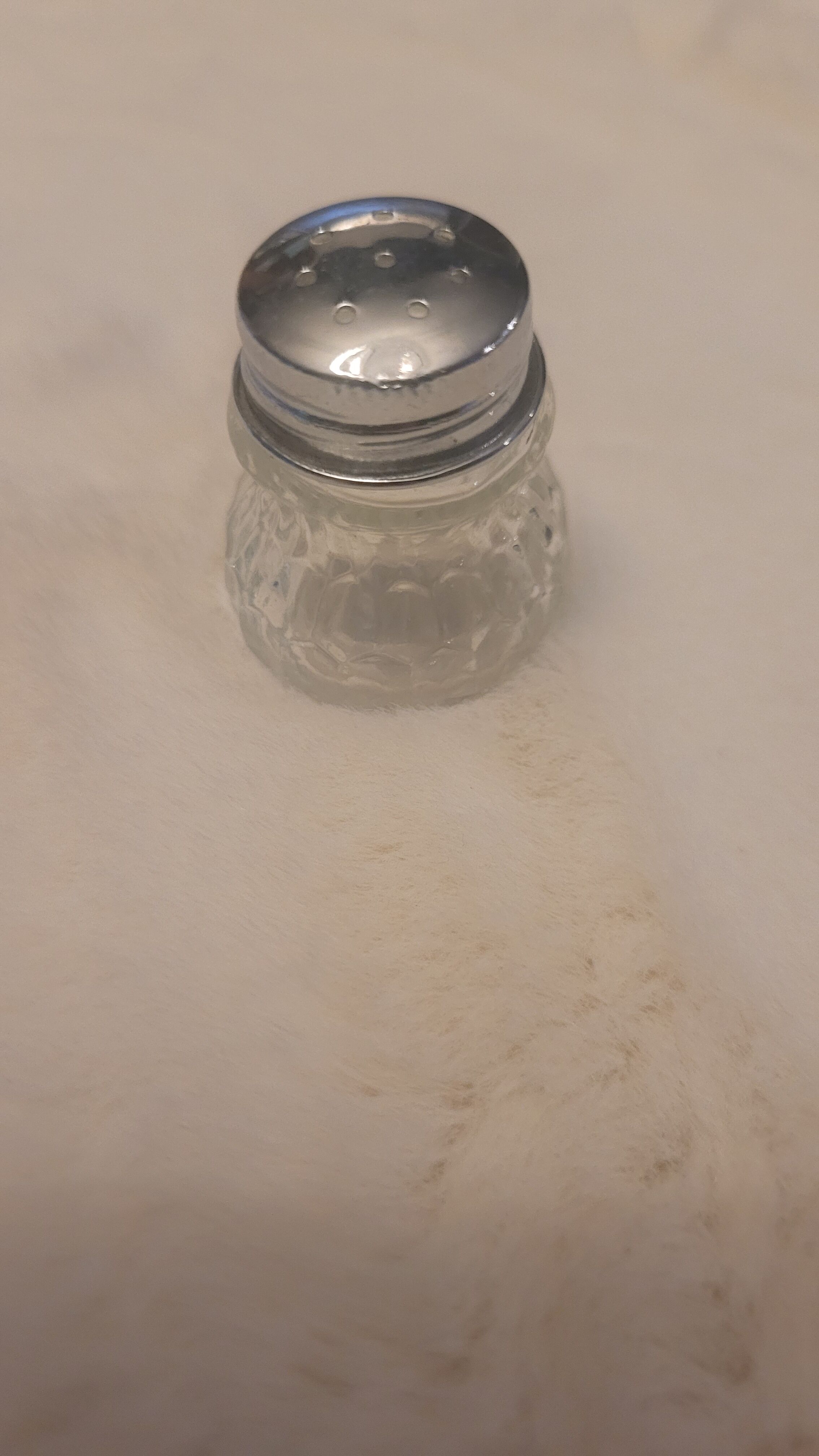 Salt and pepper and silver tray