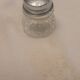 Salt and pepper and silver tray