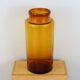 Old brown blown glass jar