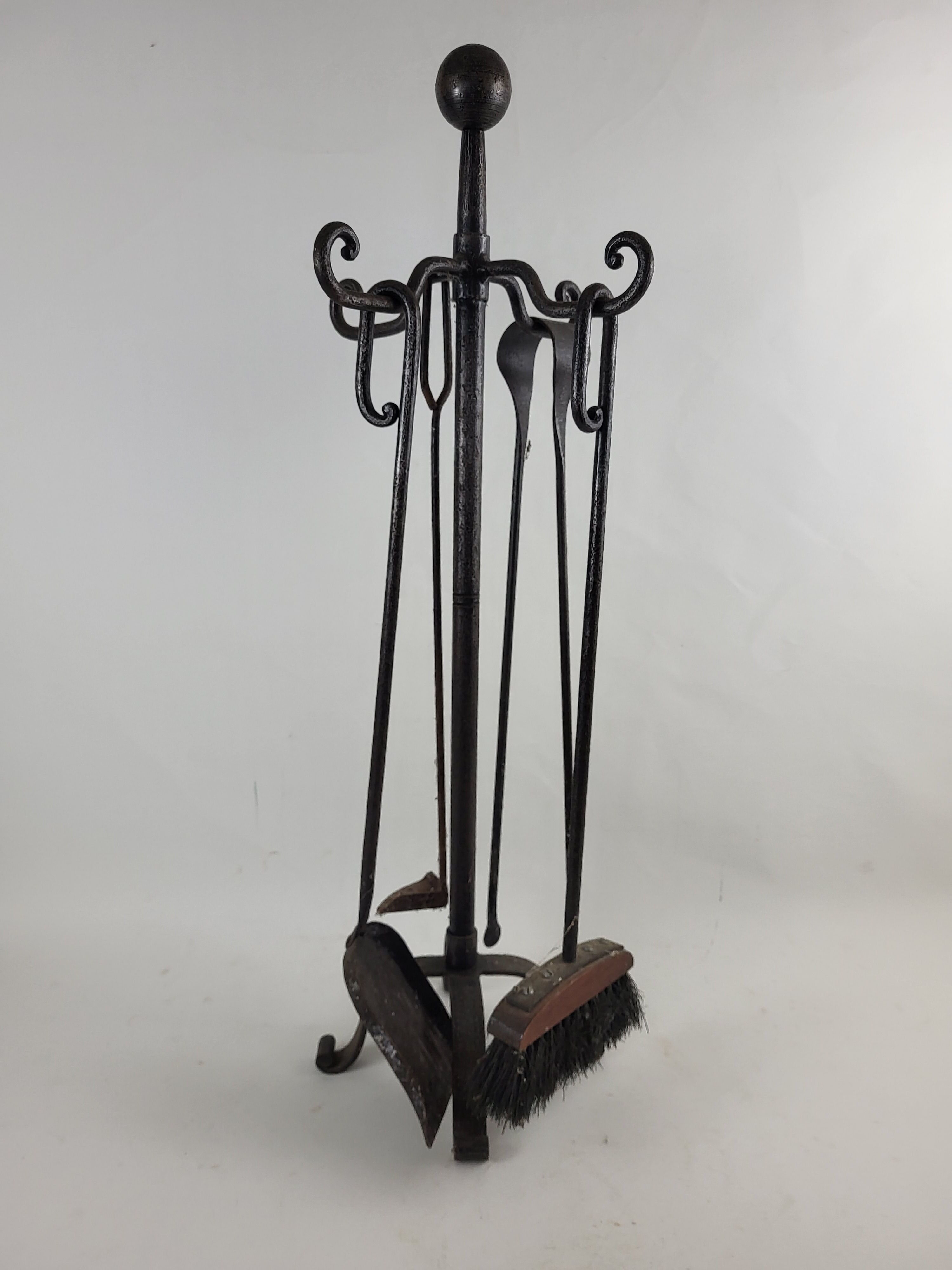 Wrought iron fireplace servant
