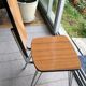 Duo de chaises en formica imitation bois marron et pieds eiffel