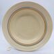 6 deep plates with fine blue and brown rim decorations.
