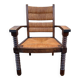 Vintage armchair in straw and brutalist wood