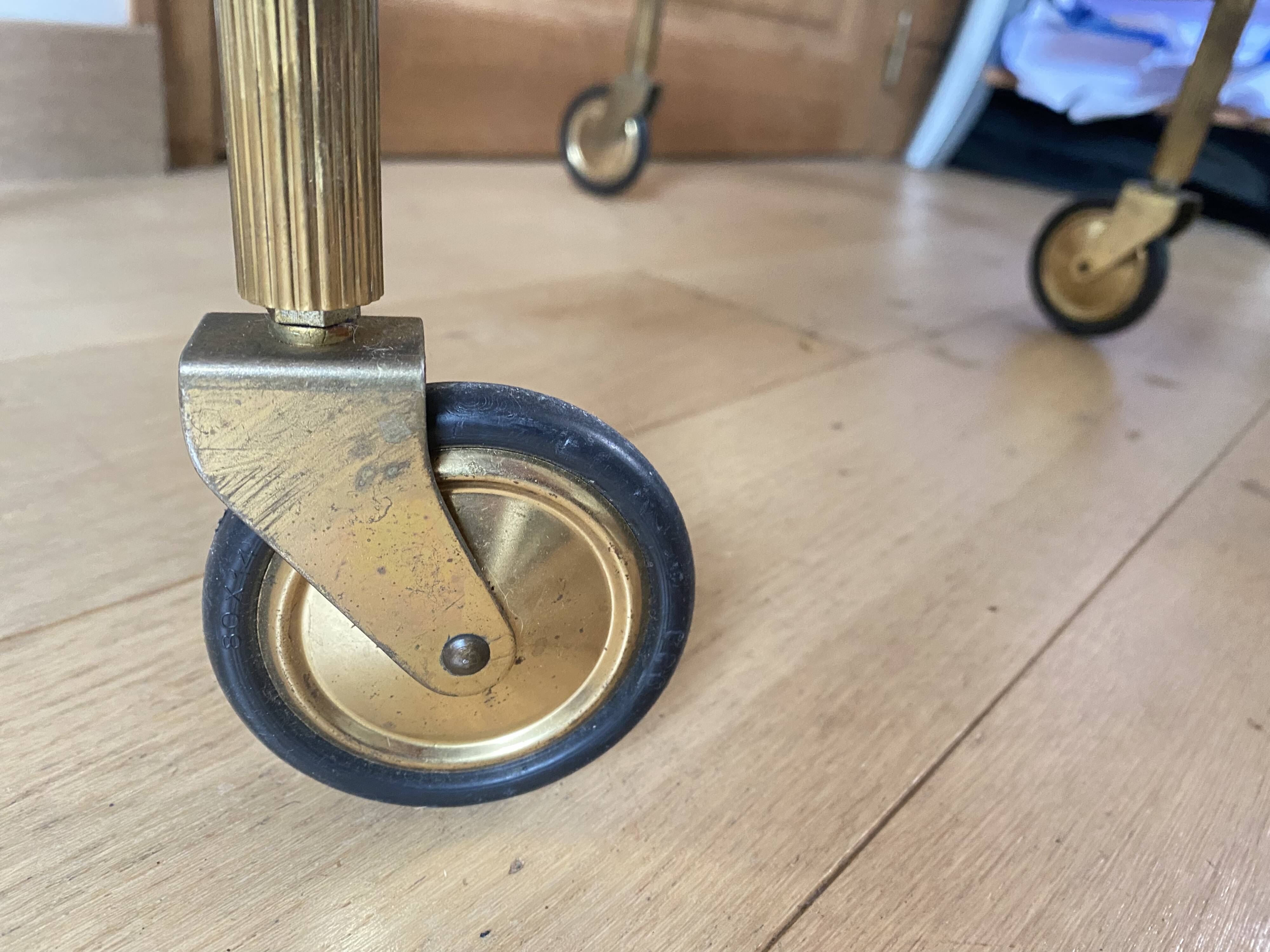 Oval golden brass rolling dessert trolley, Maison Jansen style, 1960s.