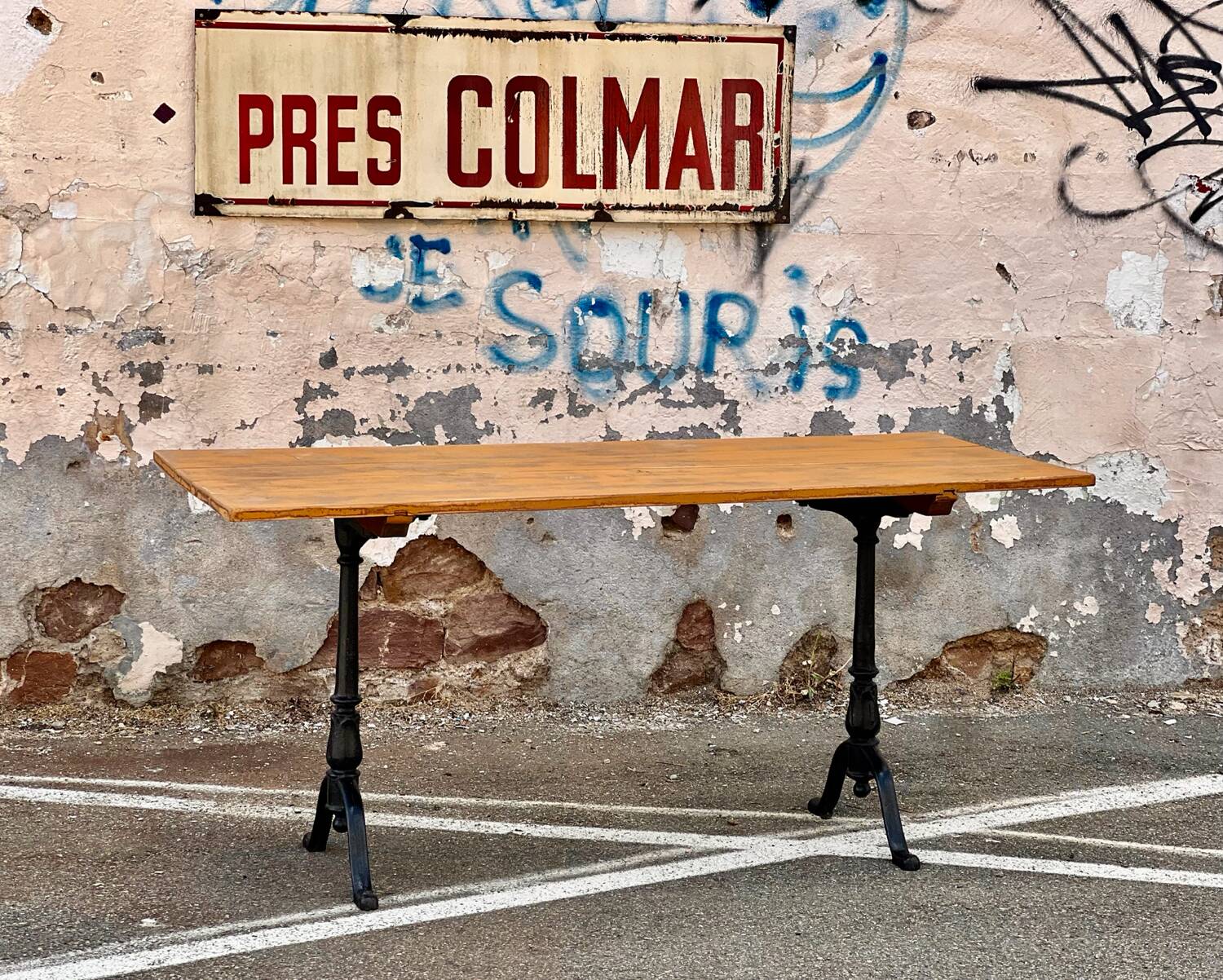 Antique bistro table with cast iron legs