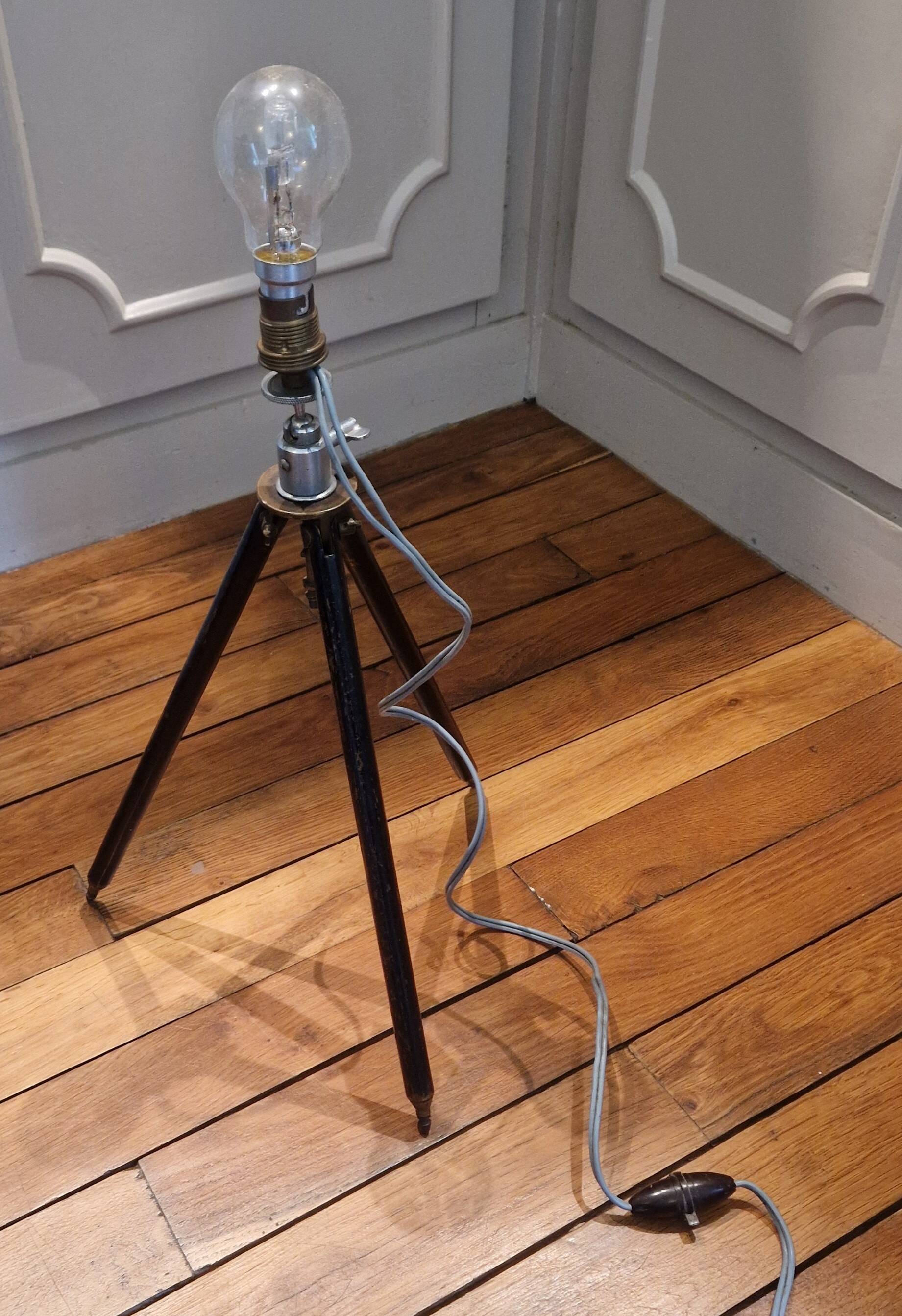Lamp on old tripod, 1920s