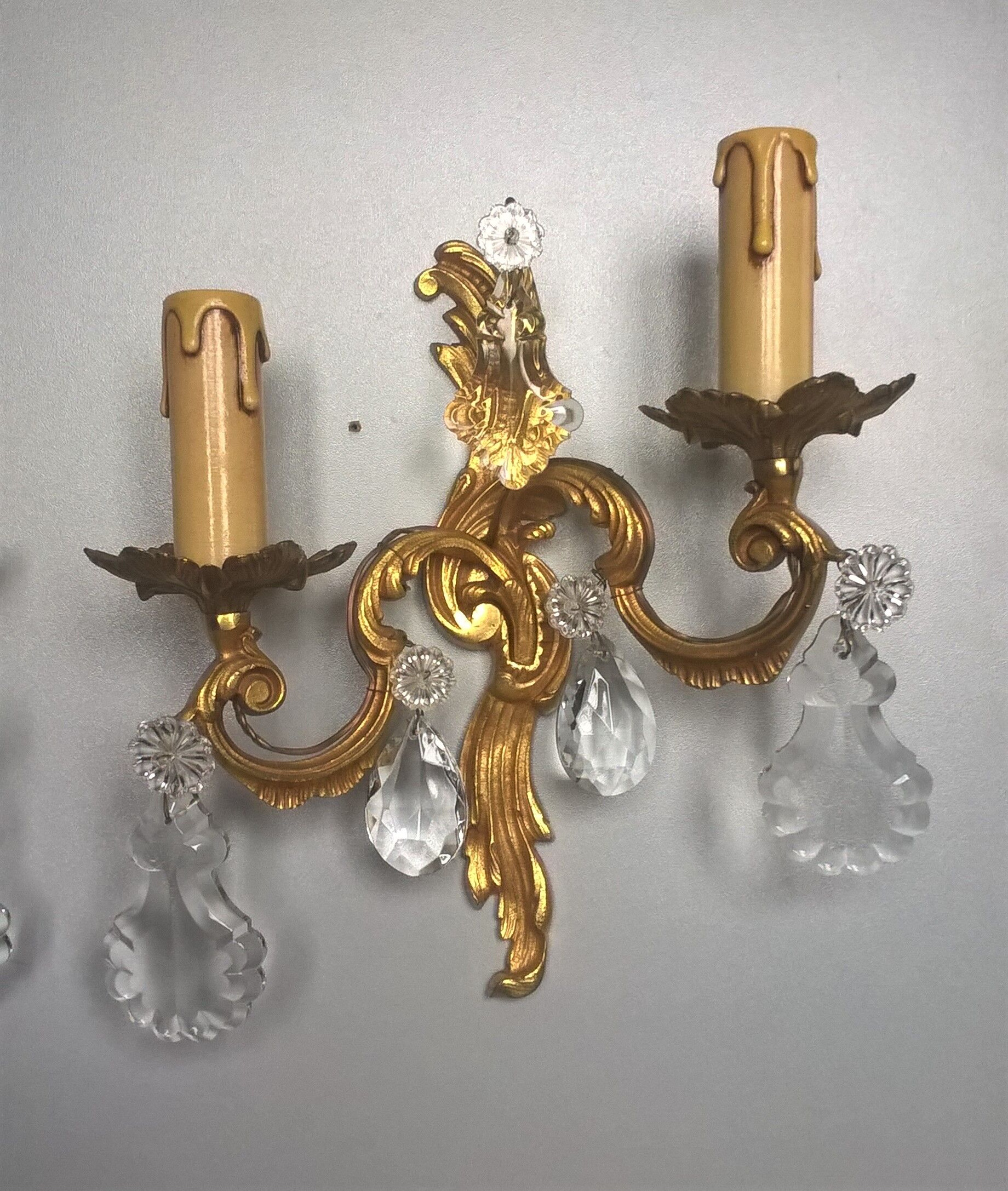 Pair of asymmetrical appliques, gilded bronze and crystal tassels, Louis XV style