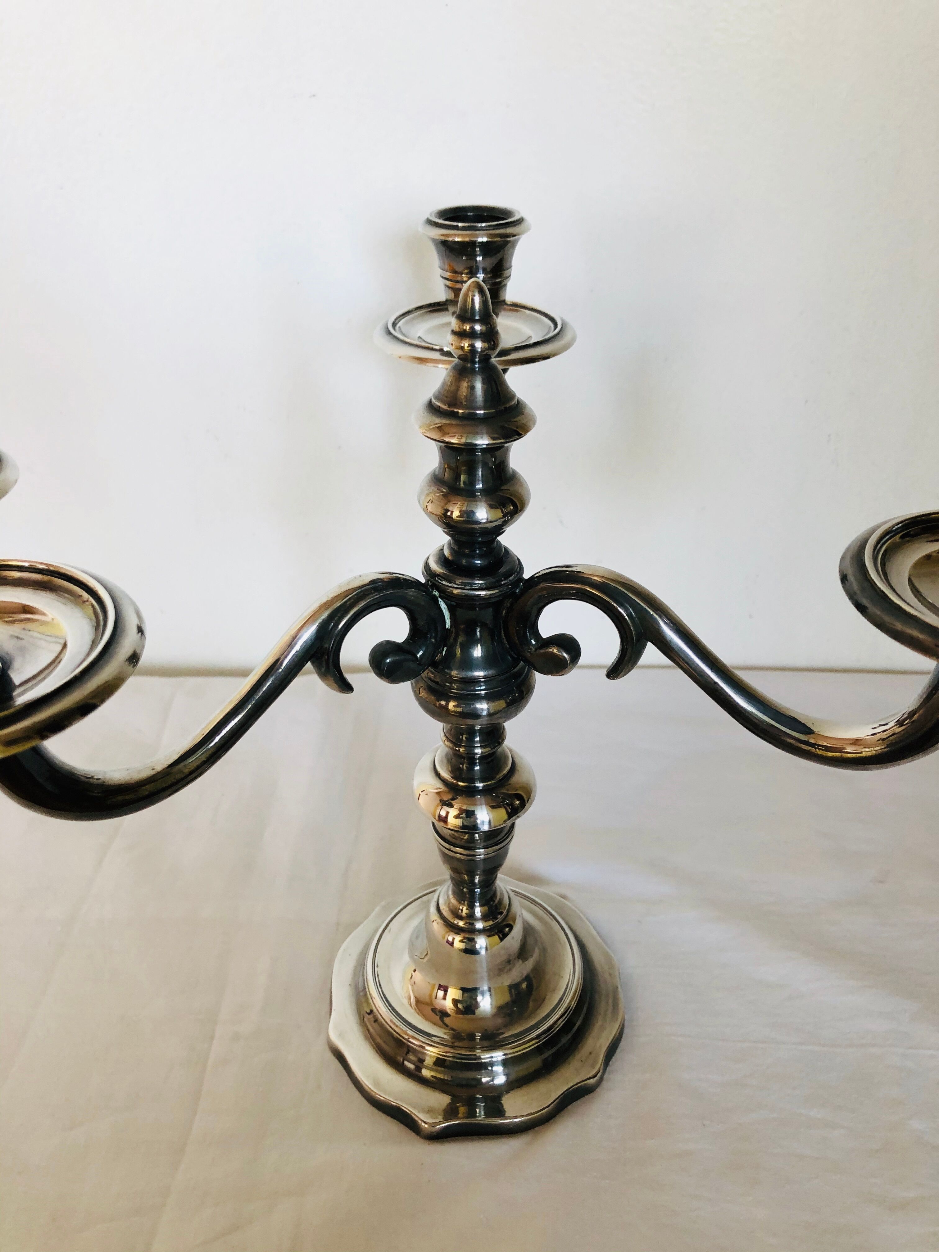 Pair of silver metal candlesticks