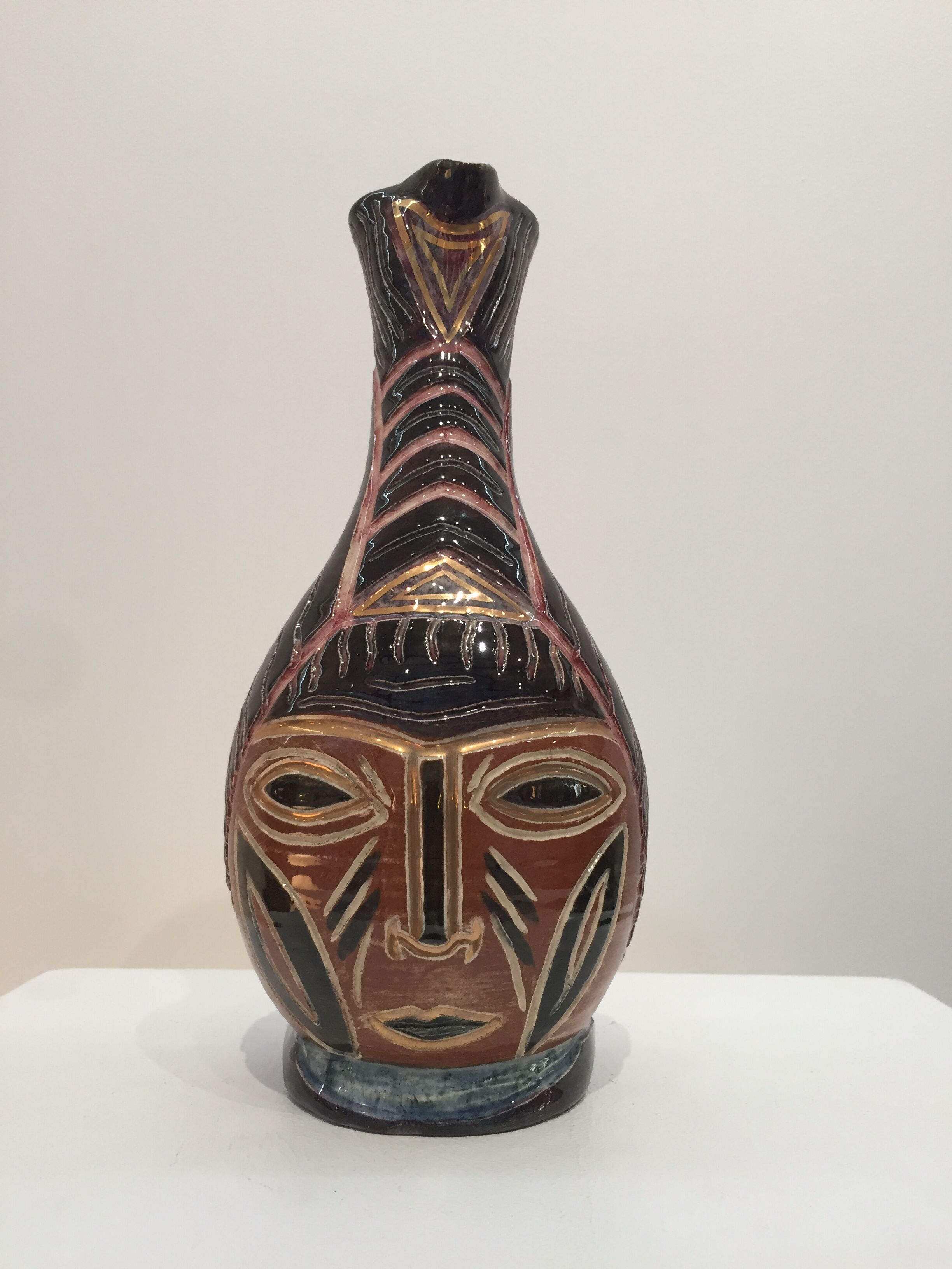 Large pitcher face decoration, signed ACCOLAY.
