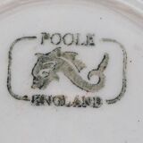 A pair of vintage bright yellow Poole Pottery - Two cups, saucers and ace