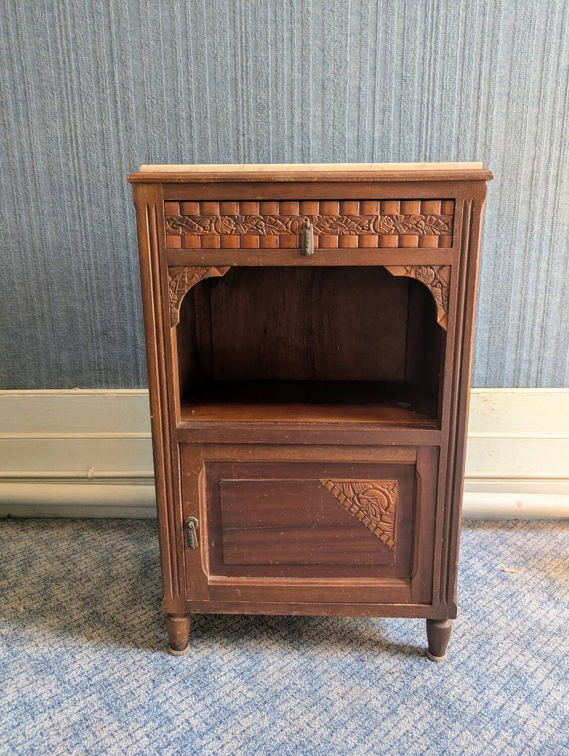 Bedside table with a marble top