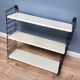 TOMADO — Modular wall shelf, design from 1958