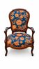 Restored Louis-Philippe cabriolet armchair, blue and orange floral fabric.