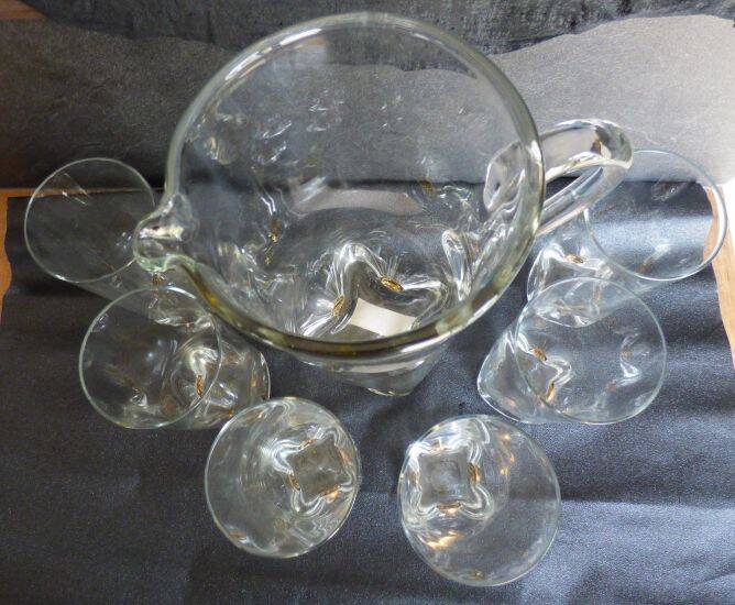 Vintage orangeade service with a jug and 6 glasses decorated with golden beads.