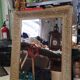 Miroir rectangulaire avec son cadre décoré