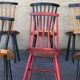 Set of 6 mismatched vintage chairs with bars and compass legs