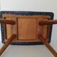 Dark blue leather stool with studs