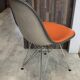 Eames Herman Miller DSR Eiffel chair in orange greige fibreglass and skai.