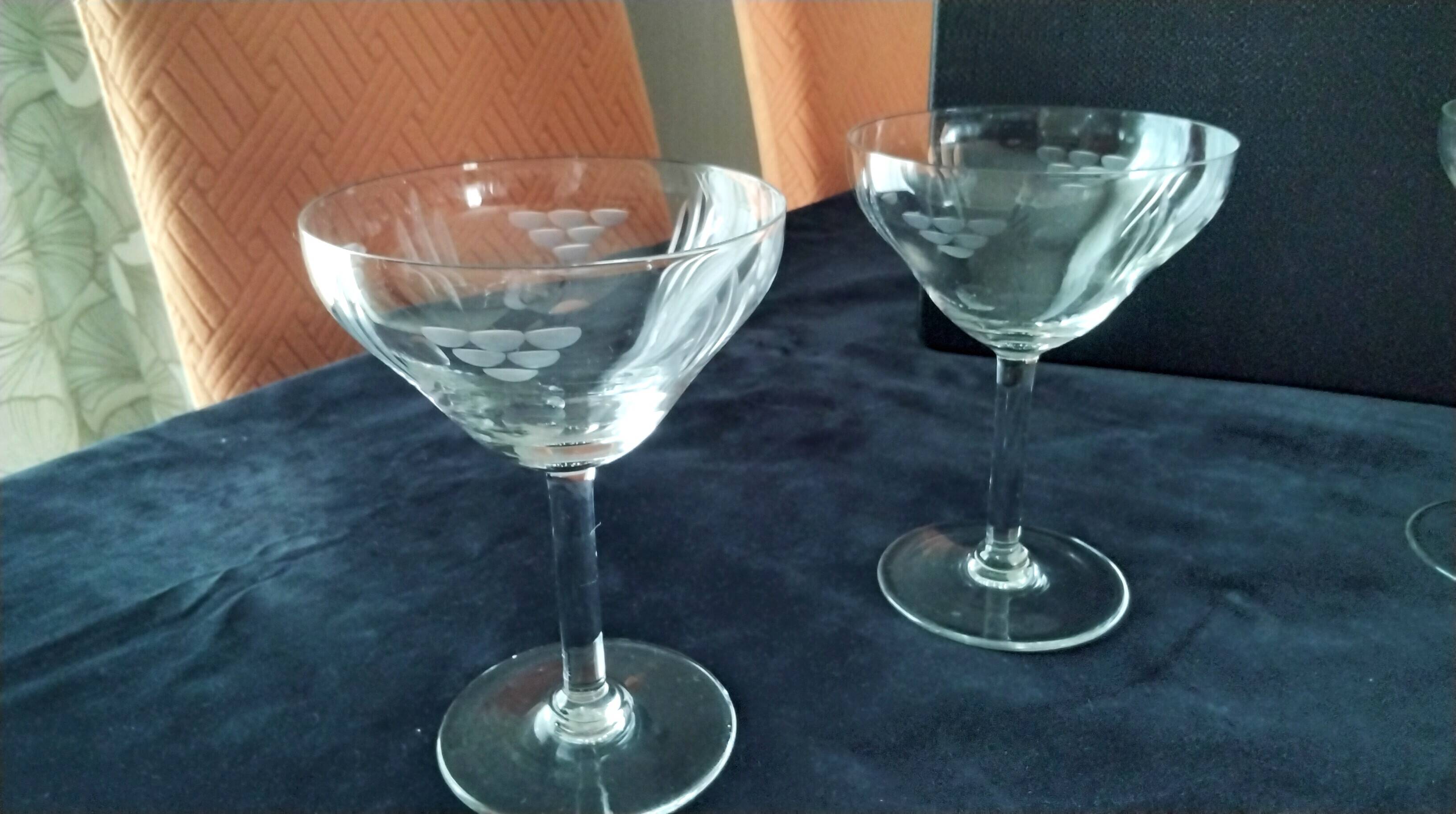 5 Vintage glass champagne coupes with engraved decoration