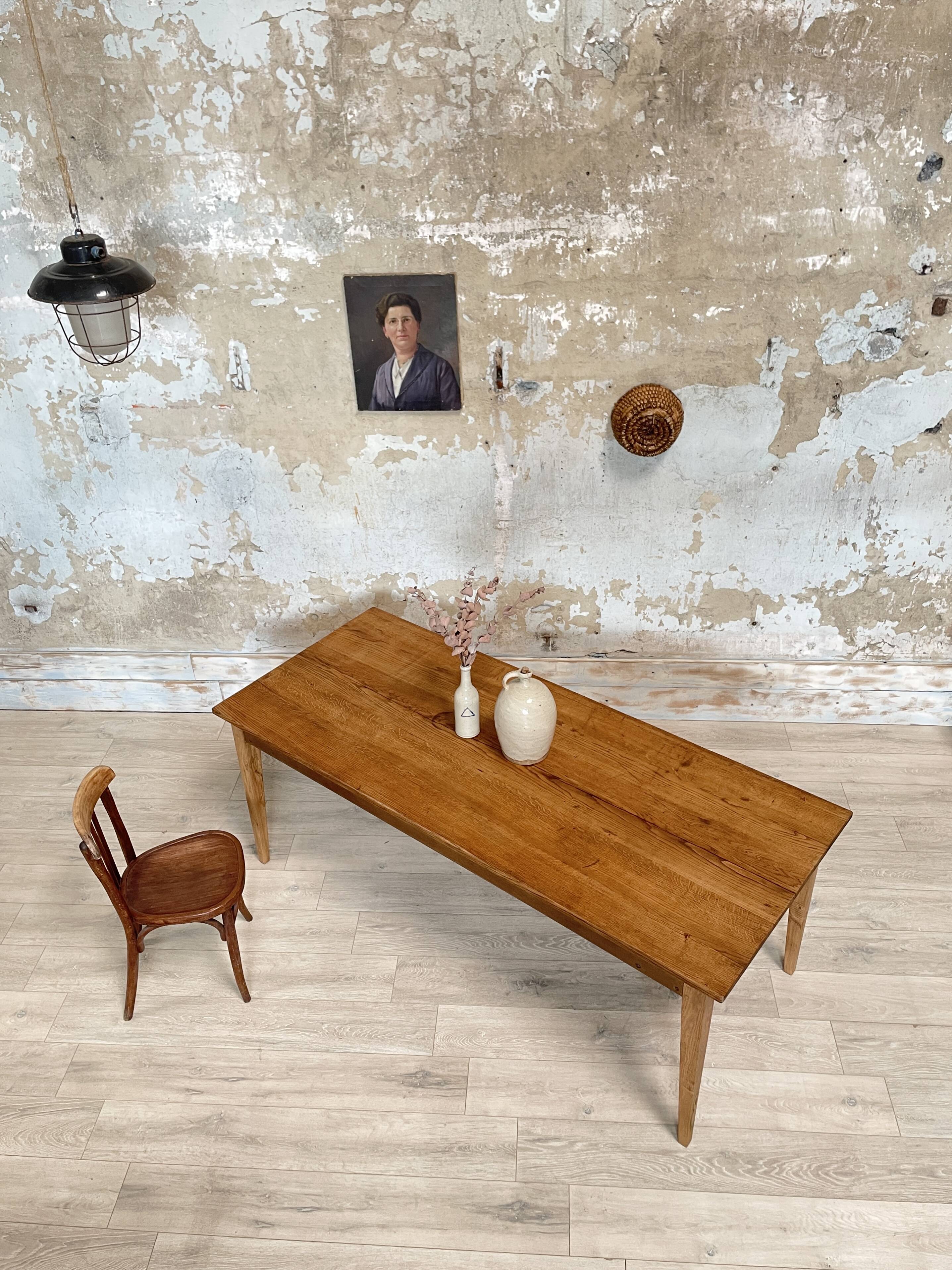 Vintage farm table with spindle legs.
