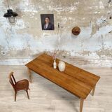 Vintage farm table with spindle legs.