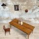 Vintage farm table with spindle legs.