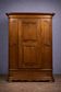 Armoire bonnetière ancienne en merisier et marquéterie – Style Louis XIV