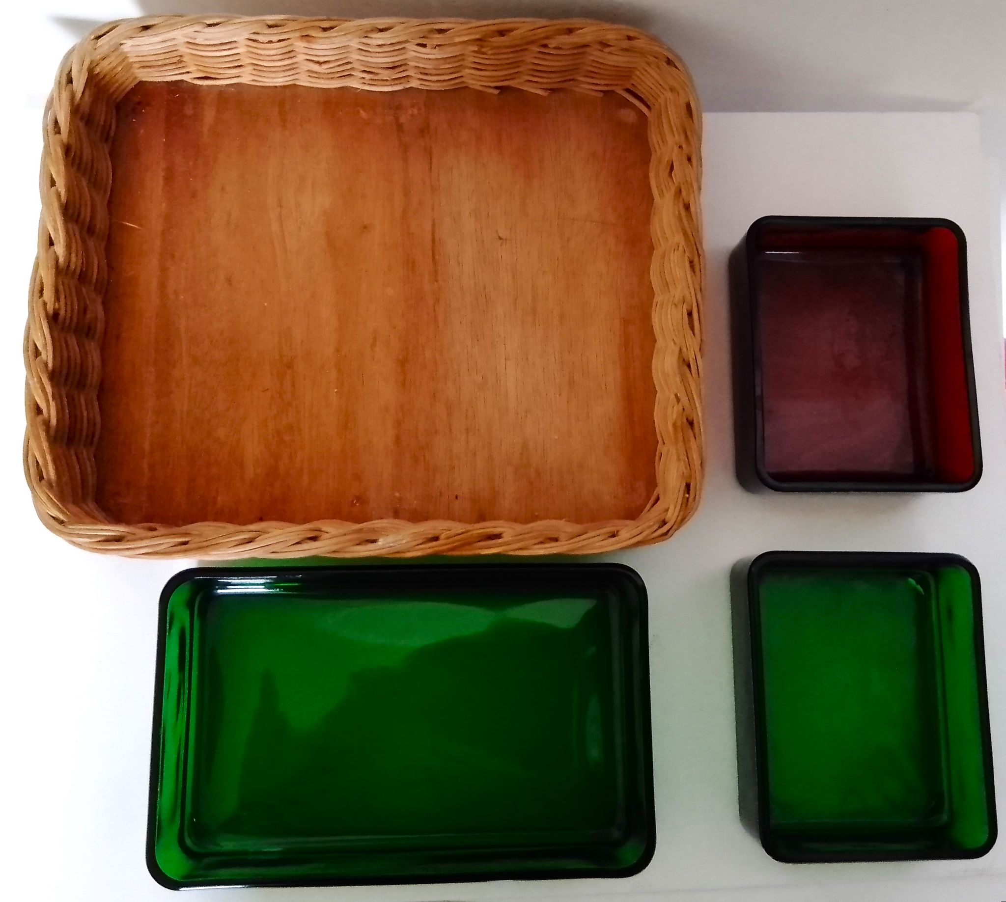 Set with appetizers, wicker tray and 3 colored glass ramekins