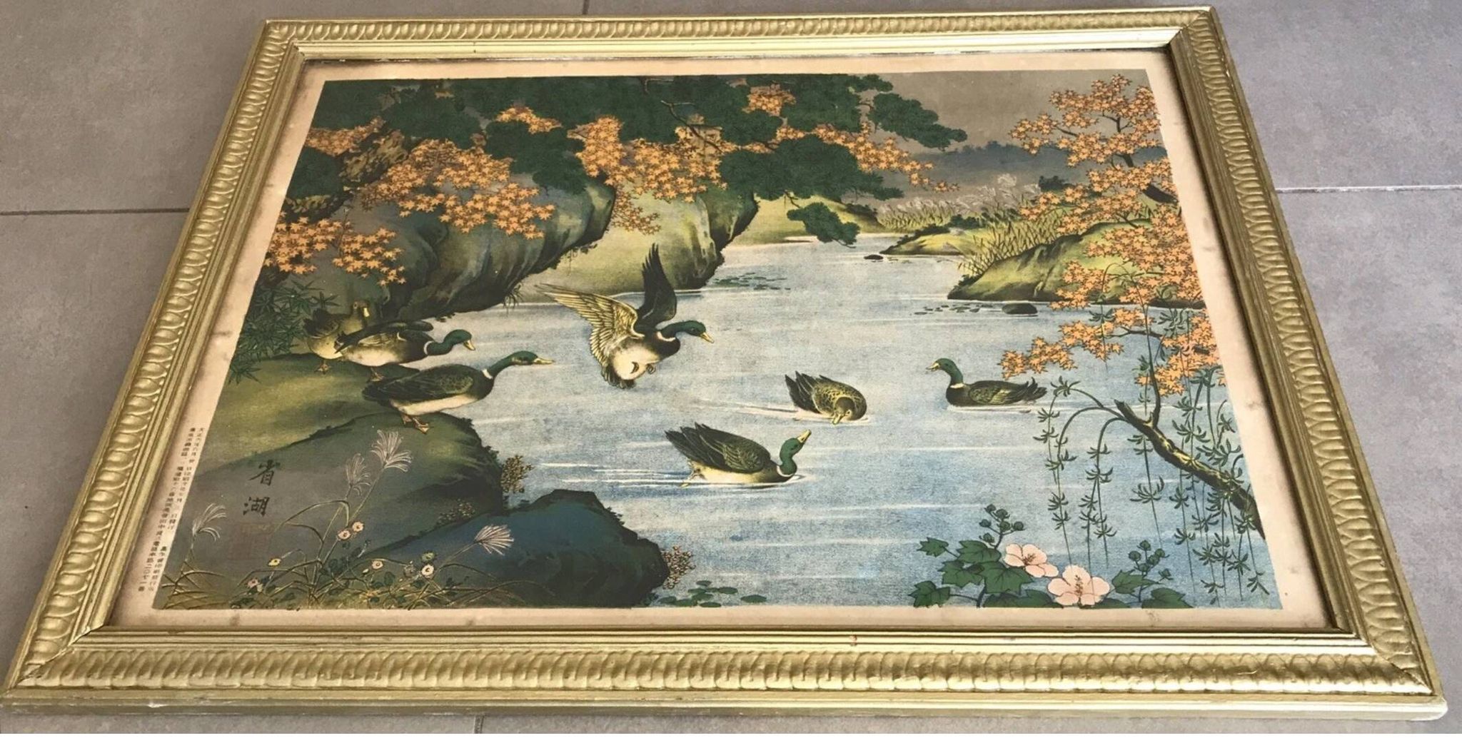 Old painting with a polychrome print decoration of ducks in nature.