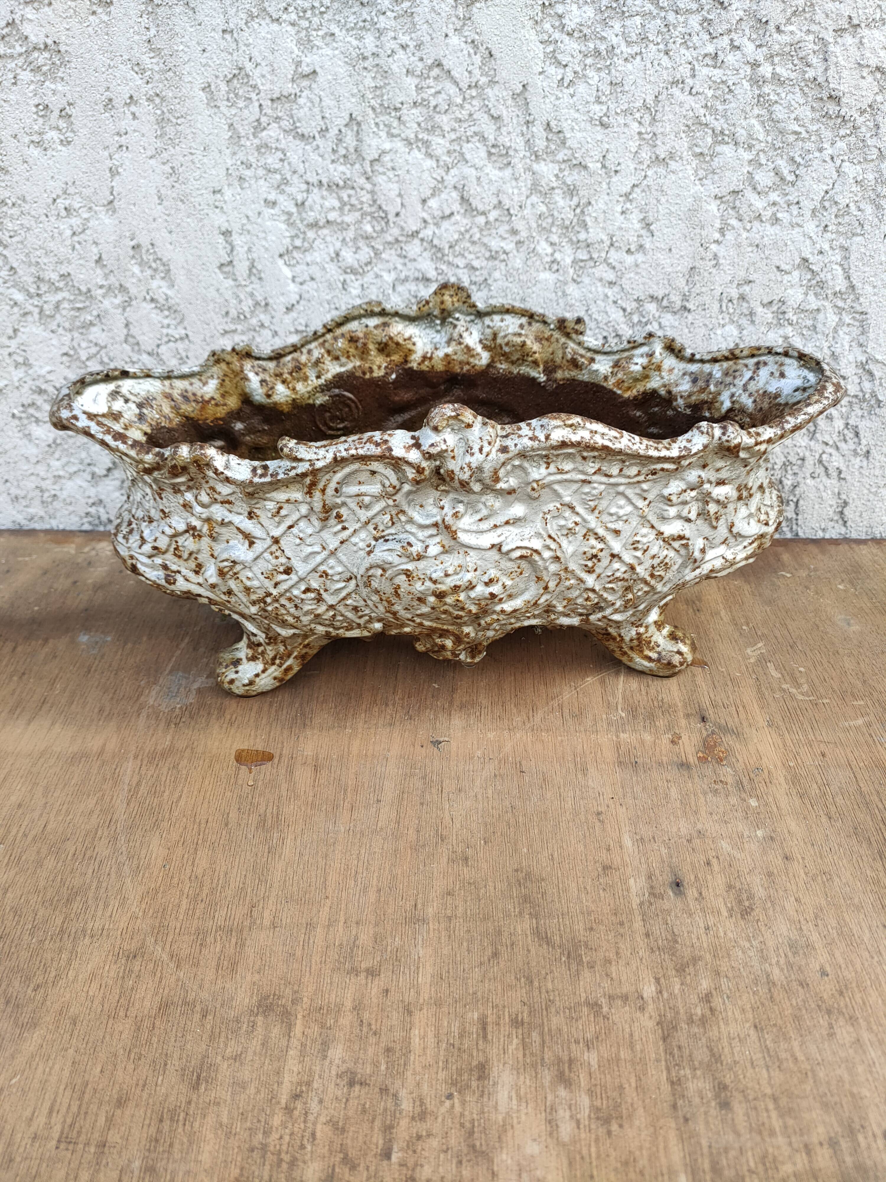 old cast iron planter