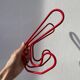 Pair of red metal wall hooks