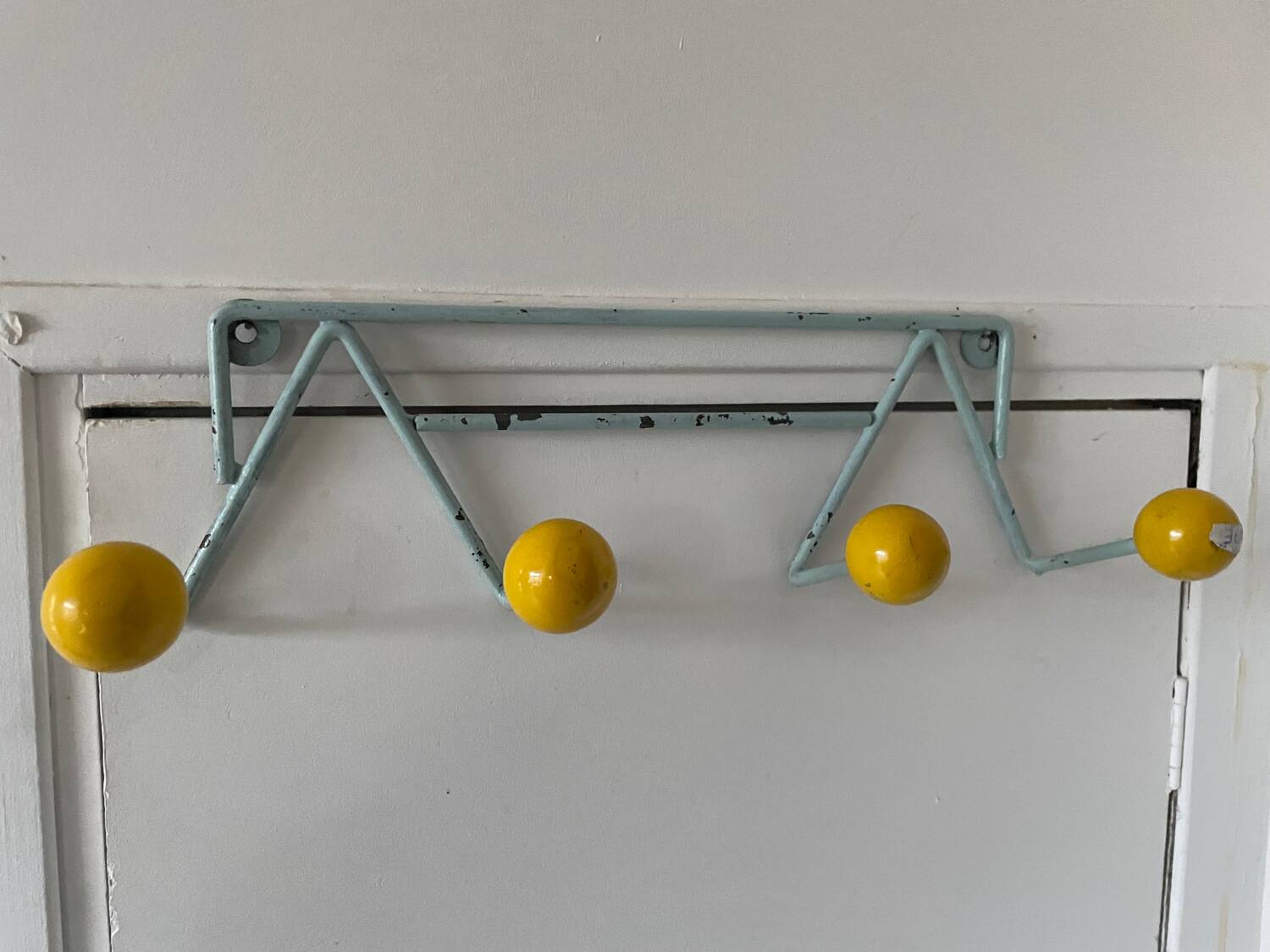 Vintage iron and wood wall coat rack